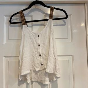 Delicate white top with embroidered straps